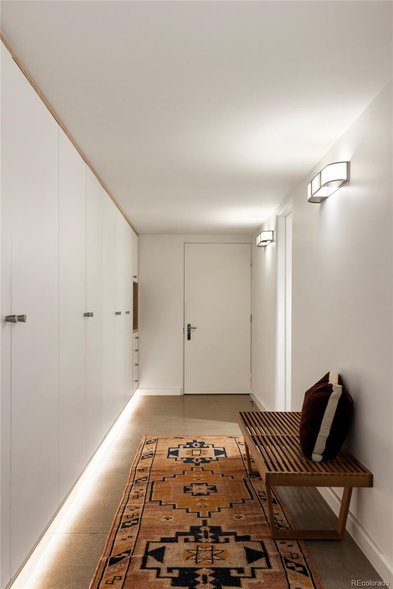 801 South Ellipse Way Denver, CO 80209 - Photo 32 of 50 a view of room with wooden floor