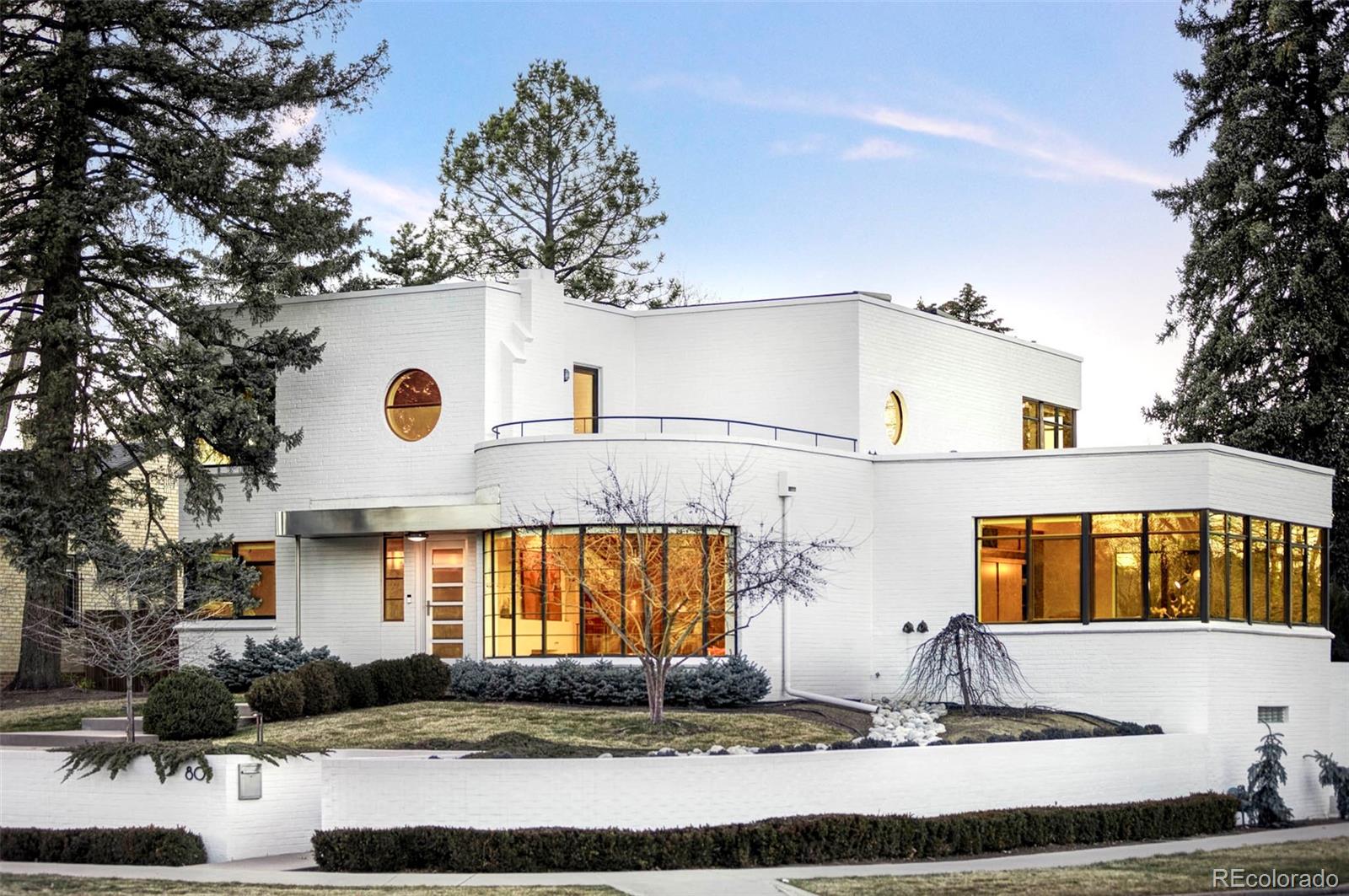801 South Ellipse Way Denver, CO 80209 - Photo 35 of 50 a front view of a house with garden