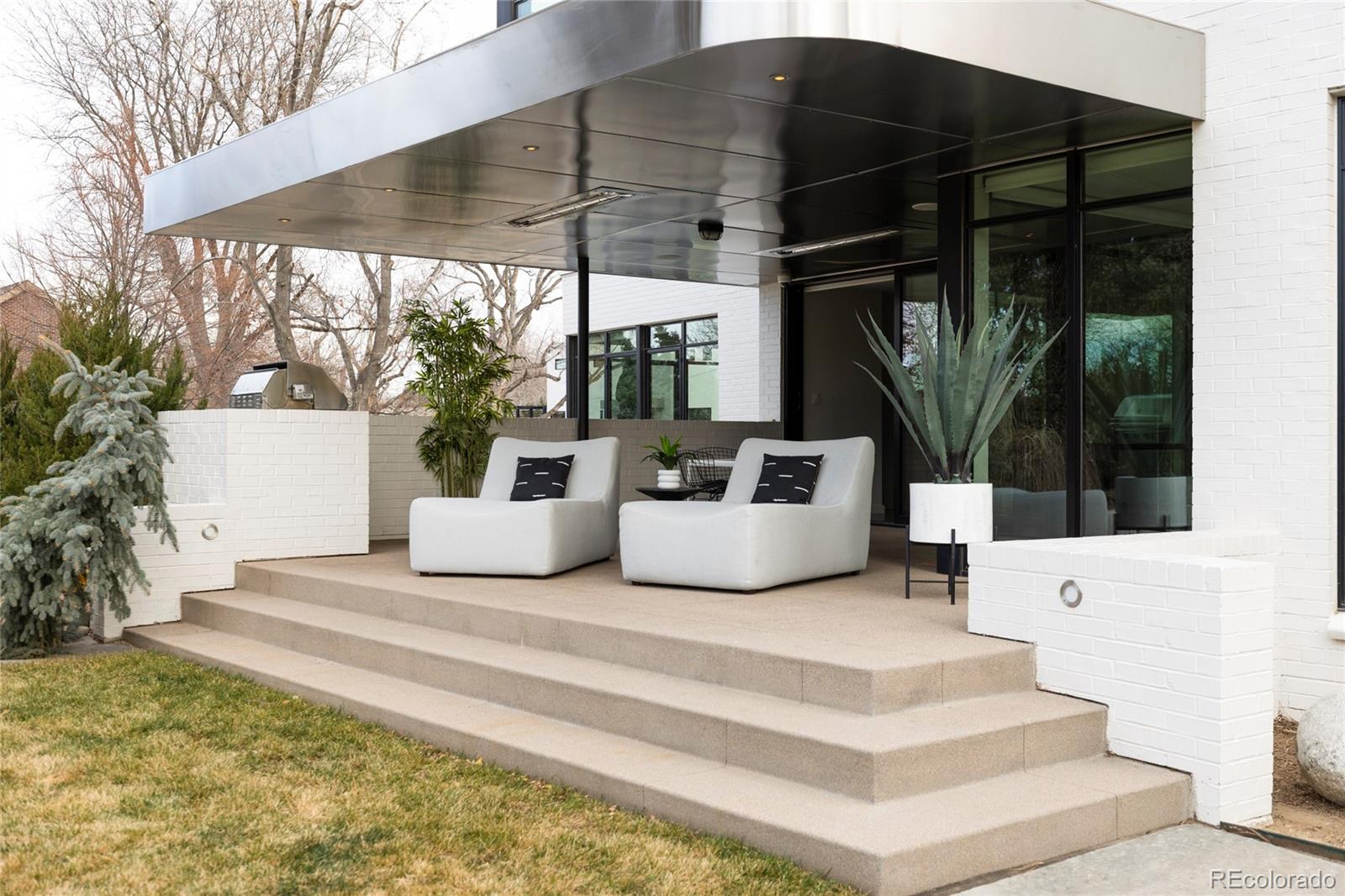 801 South Ellipse Way Denver, CO 80209 - Photo 38 of 50 a view of a two chairs in the patio