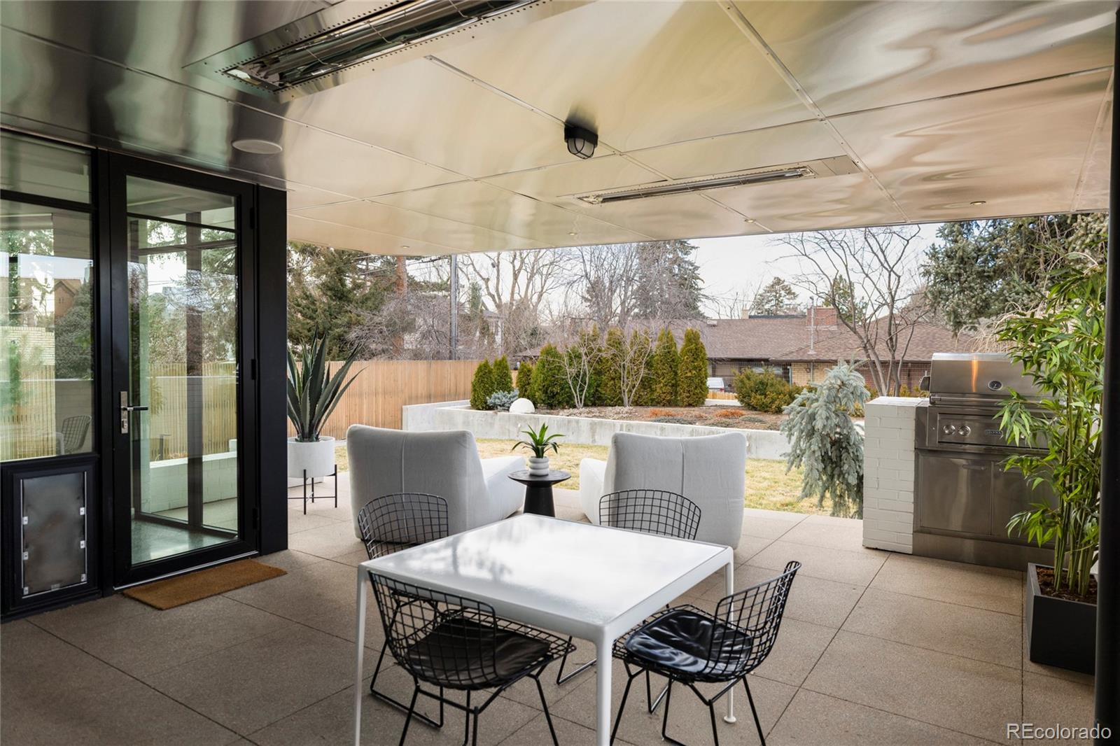 801 South Ellipse Way Denver, CO 80209 - Photo 40 of 50 a outdoor dining space with furniture and outdoor view