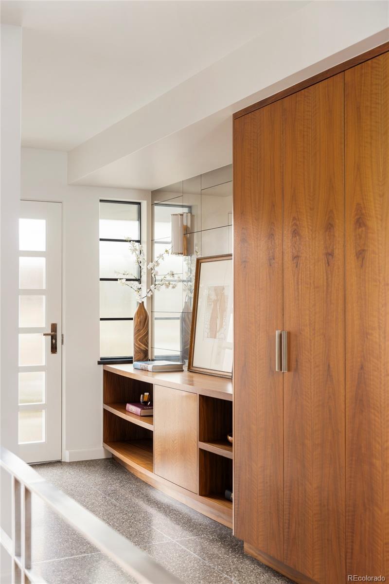 801 South Ellipse Way Denver, CO 80209 - Photo 4 of 50 a view of kitchen with stainless steel appliances wooden floor and window
