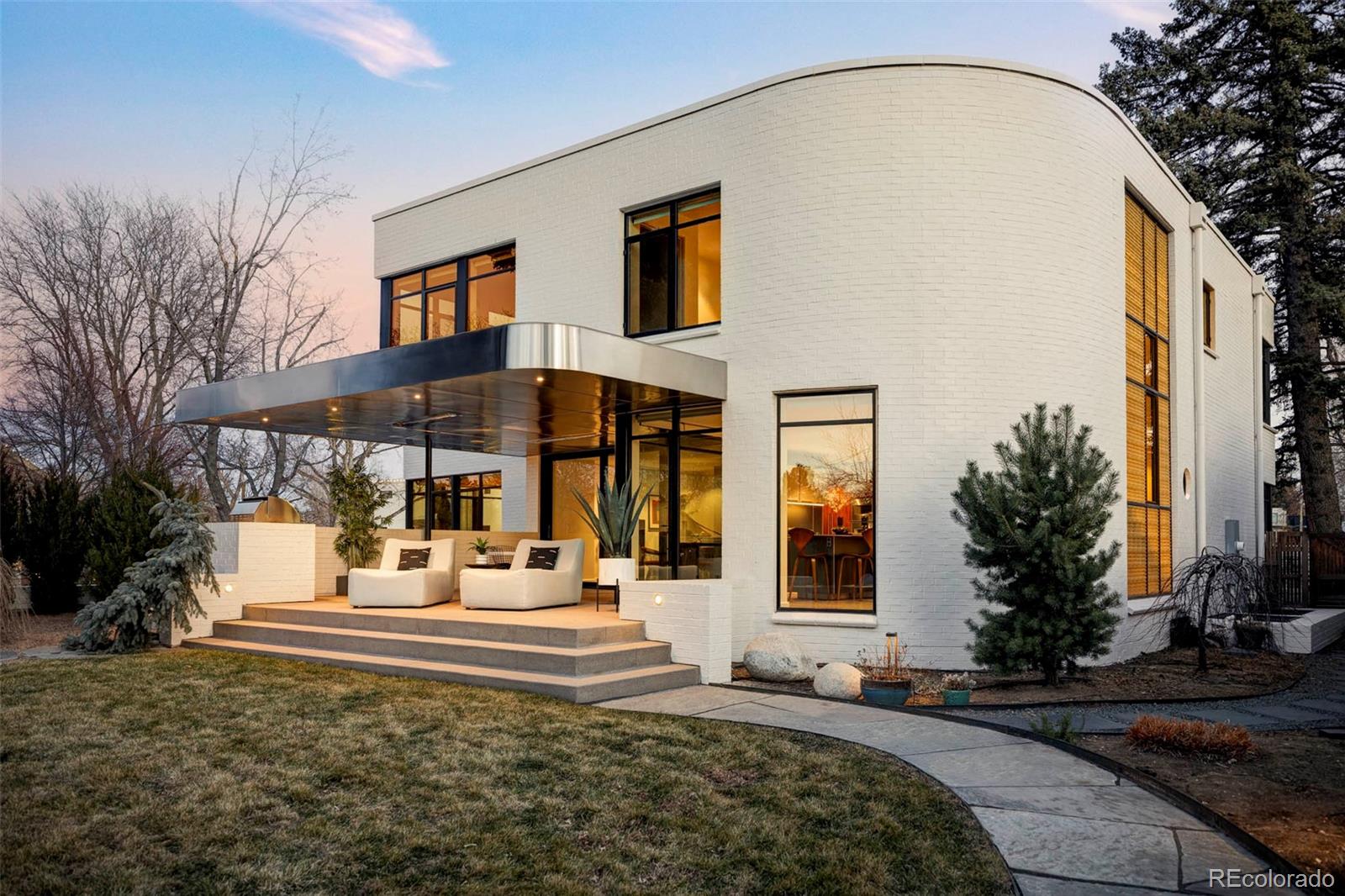 801 South Ellipse Way Denver, CO 80209 - Photo 43 of 50 a front view of a house with sitting area