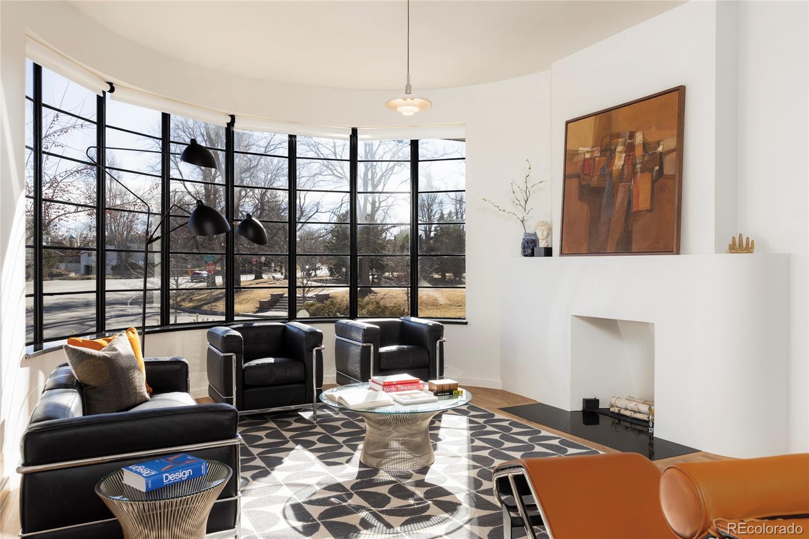 801 South Ellipse Way Denver, CO 80209 - Photo 7 of 50 a living room with furniture and a large window