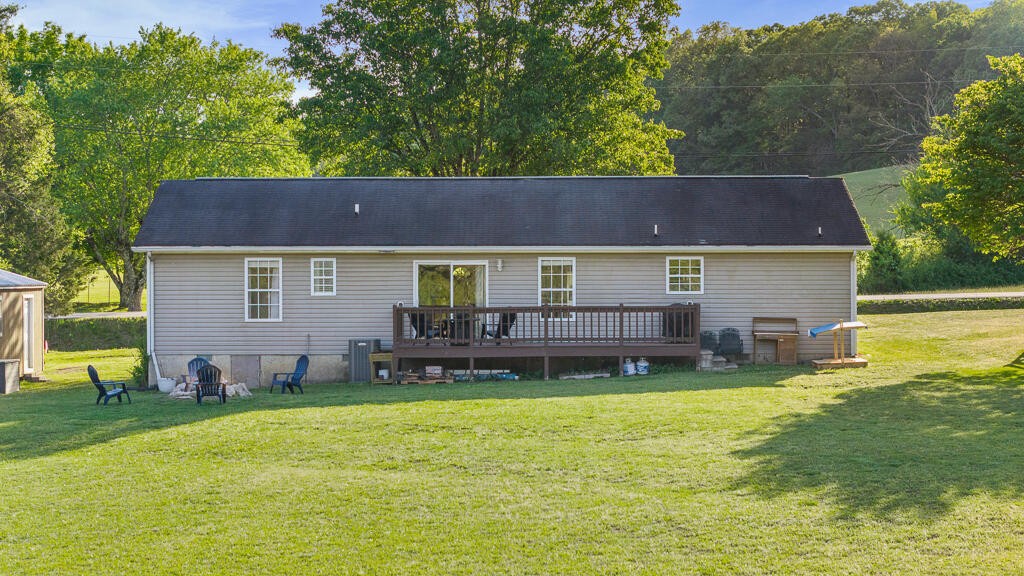 2850 Lower River Road Northwest Georgetown, TN 37336 - Photo 28 of 38 a view of a house with a yard and sitting area