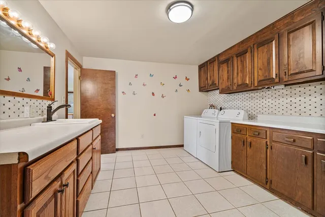 a bathroom with a shower and a sink