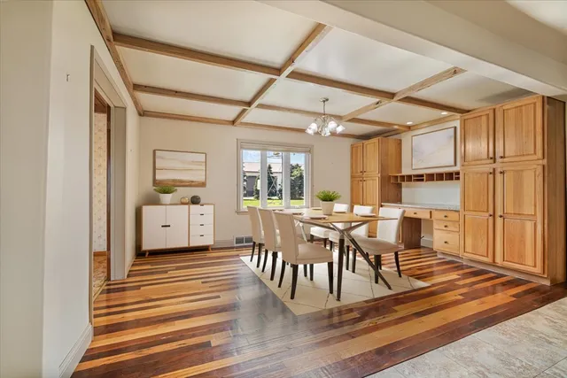 a living room with lots of furniture and a table