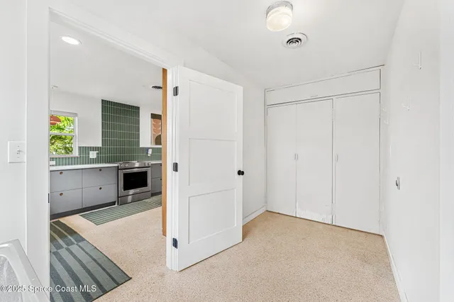a view of a kitchen with a sink