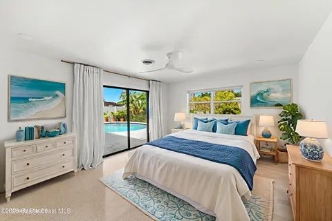 a bed room with a bed and a window