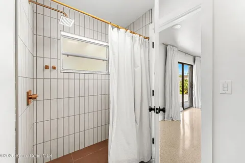 a view of a bathroom with a shower