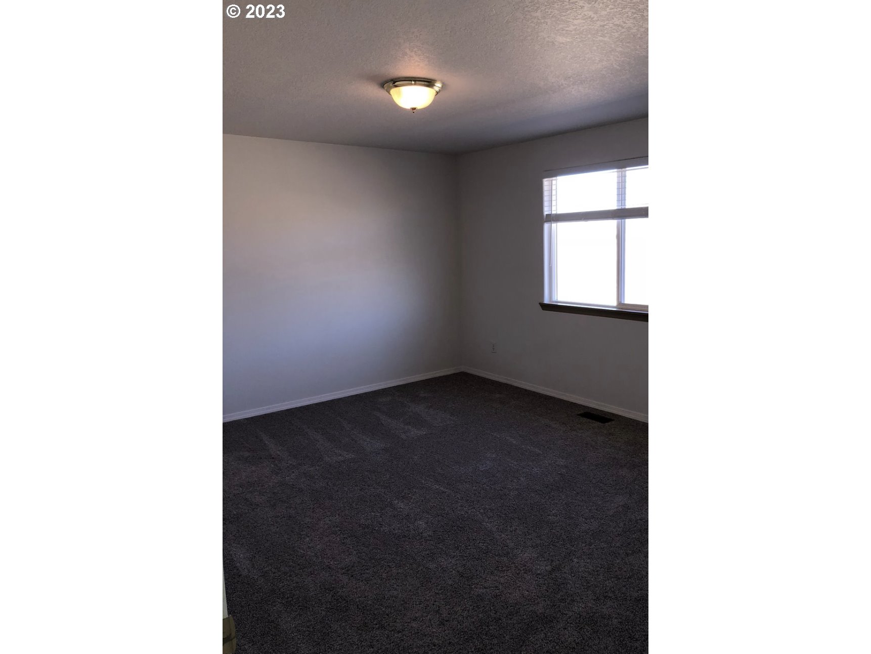 1001 Southwest Nye Avenue Pendleton, OR 97801 - Photo 10 of 14 a picture of a room with a window