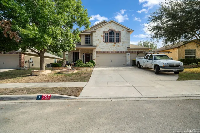 front view of a house with a street