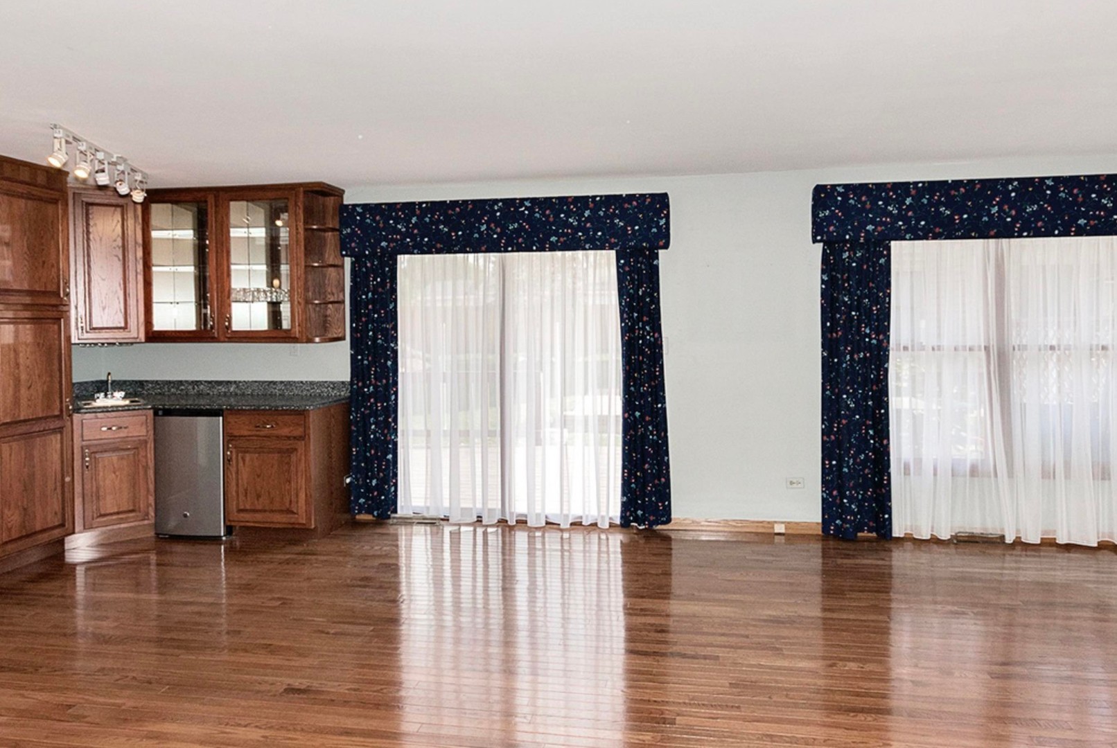 57 South Wolf Road Wheeling, IL 60090 - Photo 14 of 31 a view of empty room with wooden floor and fan