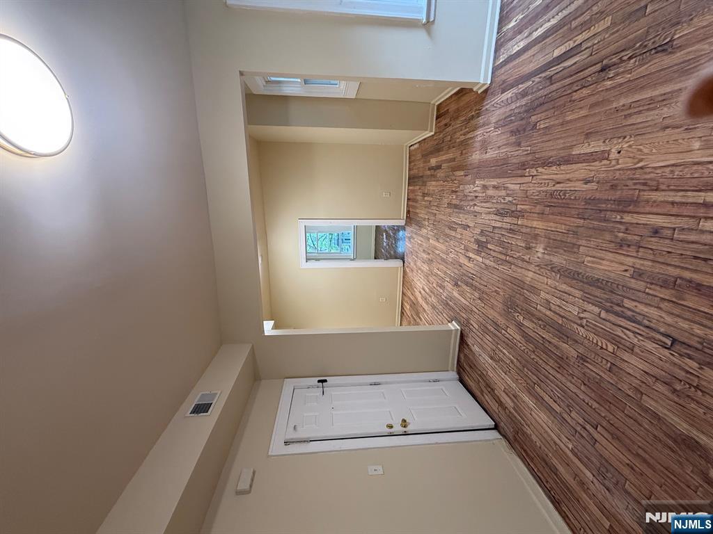 149-151 Scheerer Avenue, Unit 2 Newark, NJ 07112 - Photo 6 of 11 a view of empty room with wooden floor