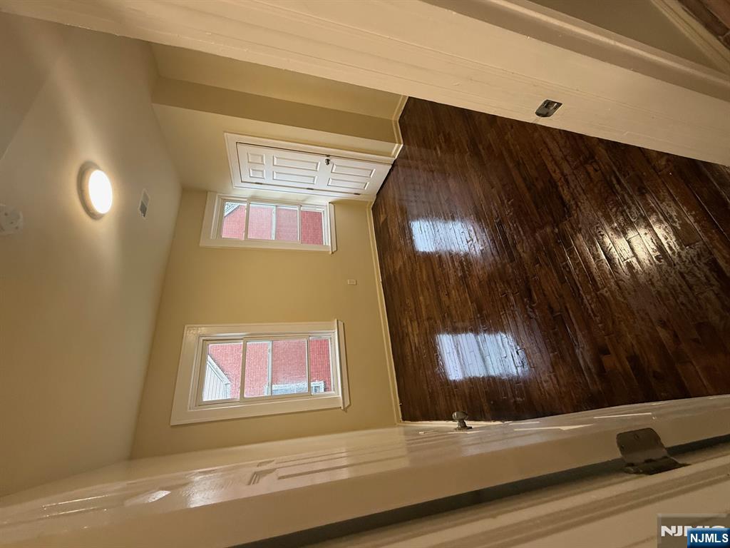 149-151 Scheerer Avenue, Unit 2 Newark, NJ 07112 - Photo 10 of 11 a view of an empty room and window