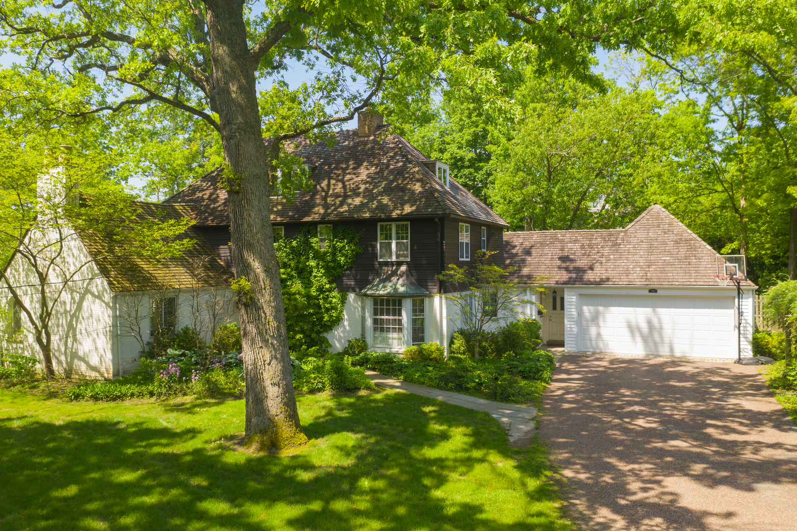 710 Walden Road Winnetka, IL 60093 - Photo 2 of 28 a front view of a house with a yard