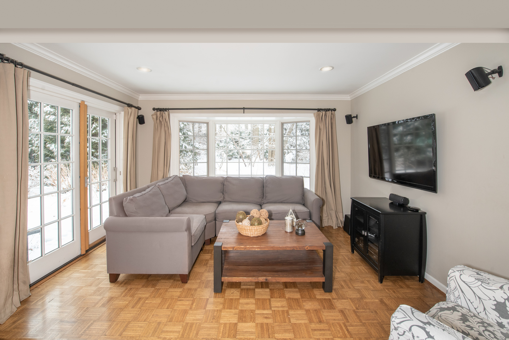 710 Walden Road Winnetka, IL 60093 - Photo 14 of 28 a living room with furniture and a flat screen tv