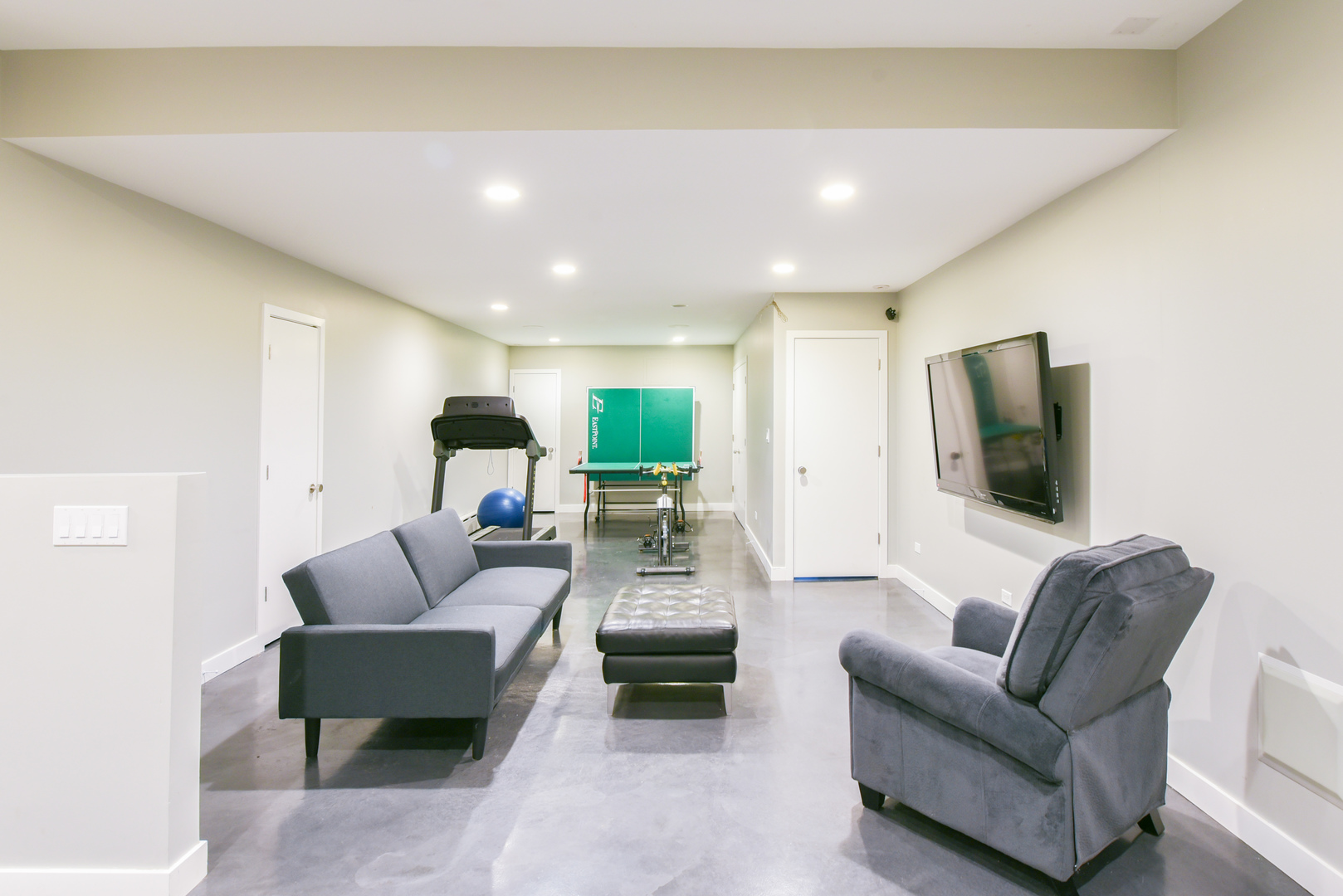710 Walden Road Winnetka, IL 60093 - Photo 23 of 28 a living room with furniture and a flat screen tv