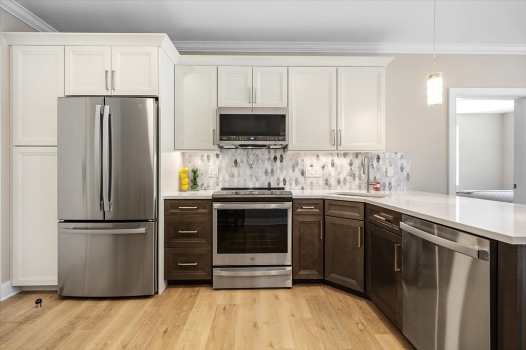 21 Totman Street, Unit 201 Quincy, MA 02169 - Photo 6 of 22