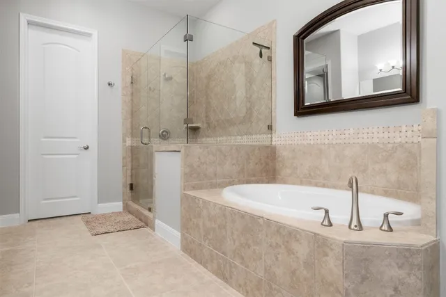 a bathroom with a bathtub and a sink