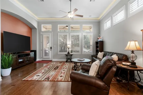 a living room with furniture or couch and a window