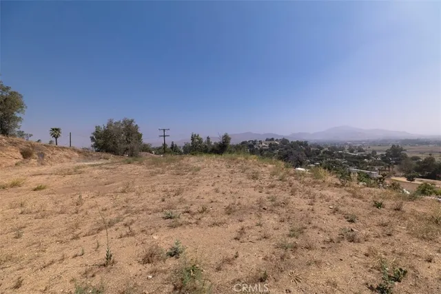 a view of a backyard of a house
