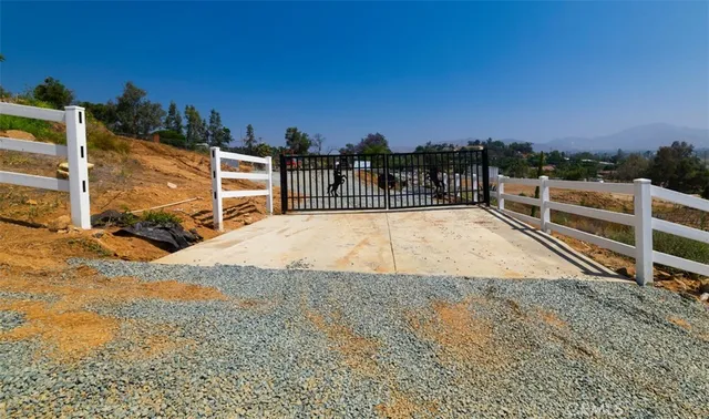 a view of a swimming pool with an outdoor seating