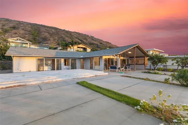 front view of a house with a street