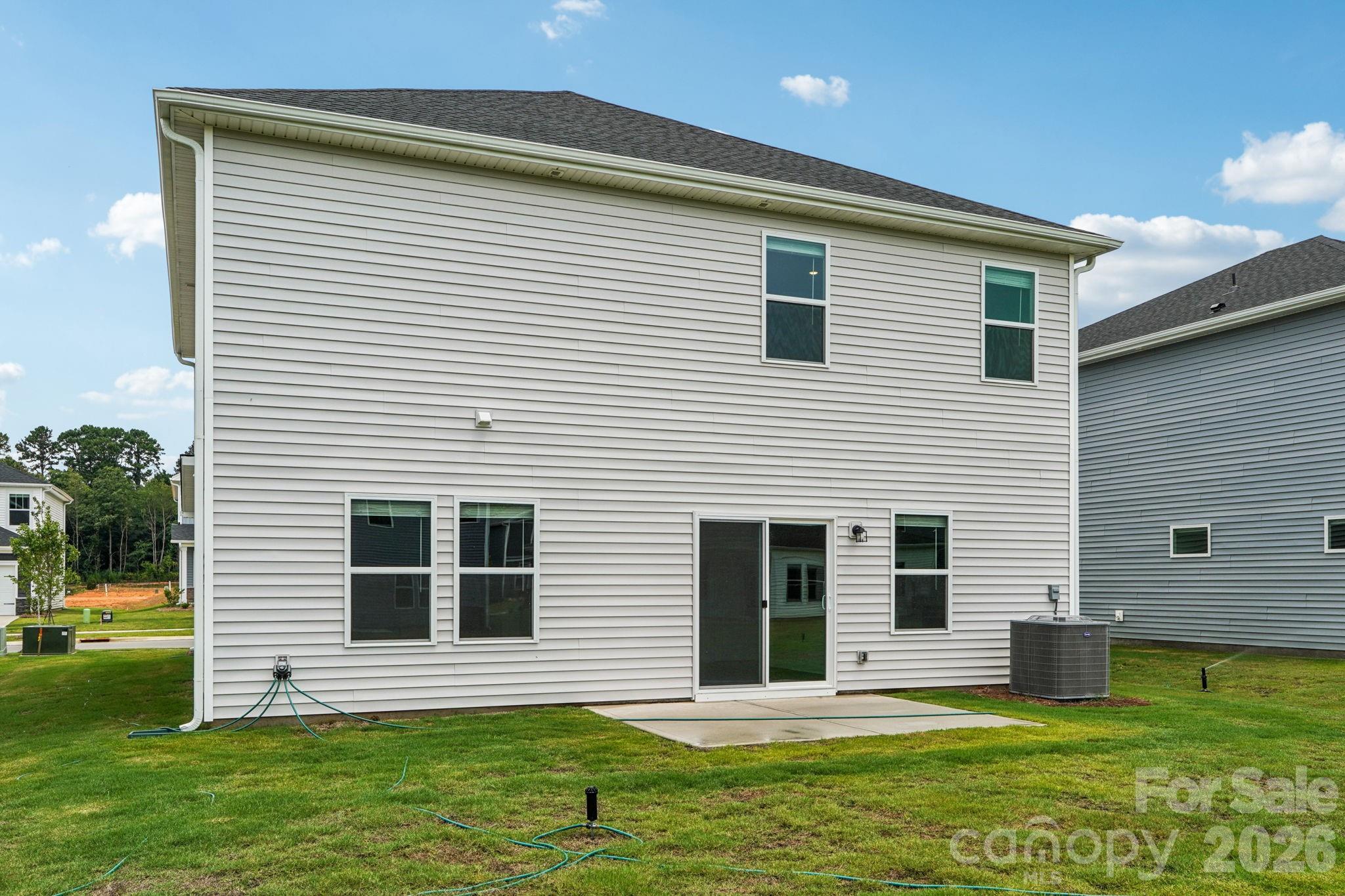 2452 Chartwell Street Stanley, NC 28164 - Photo 15 of 15 a front view of a house with a yard