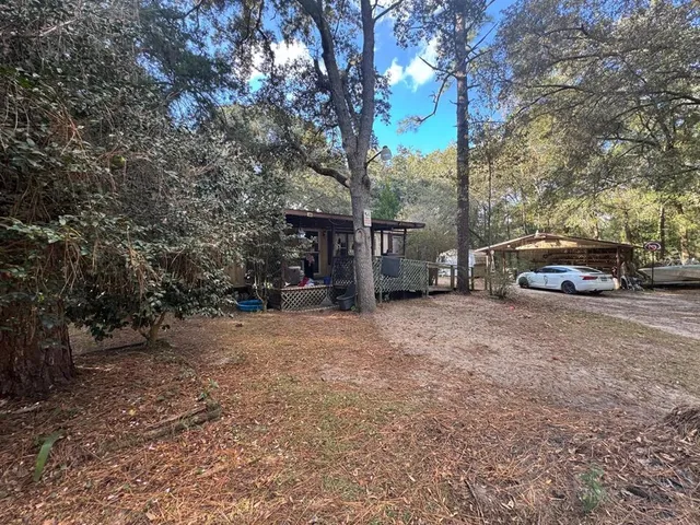a view of street with parked cars