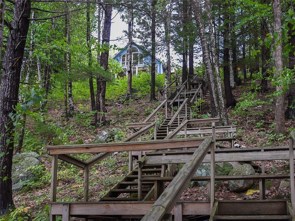 355 Gore Road Naples, ME 04055 - Photo 16 of 33 Well crafted stairway with multiple...