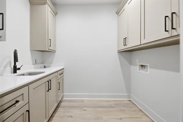 a view of a kitchen with sink