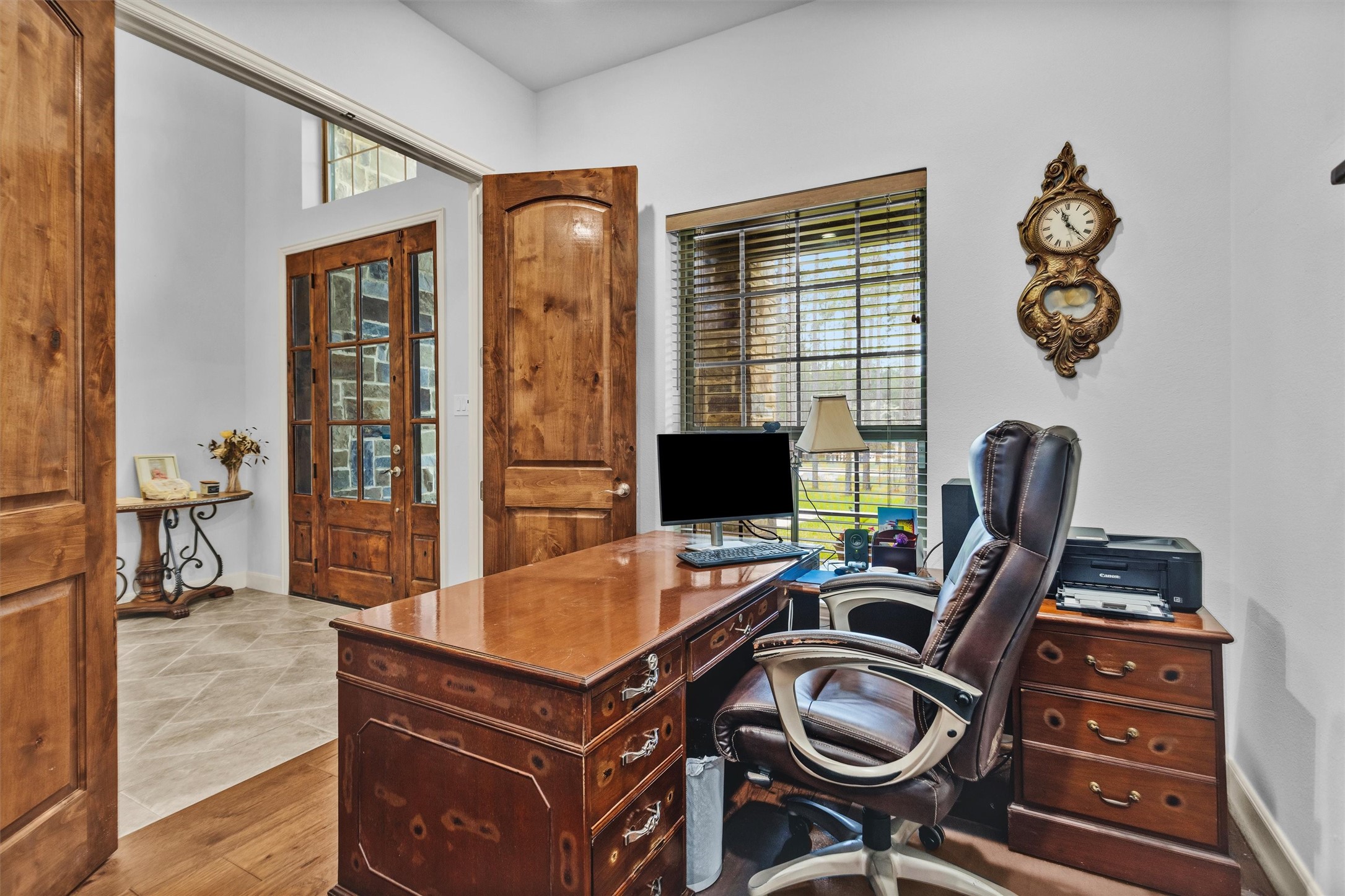 264 Grey Feather Road Huntsville, TX 77340 - Photo 13 of 31 a view of a workspace with furniture and a window