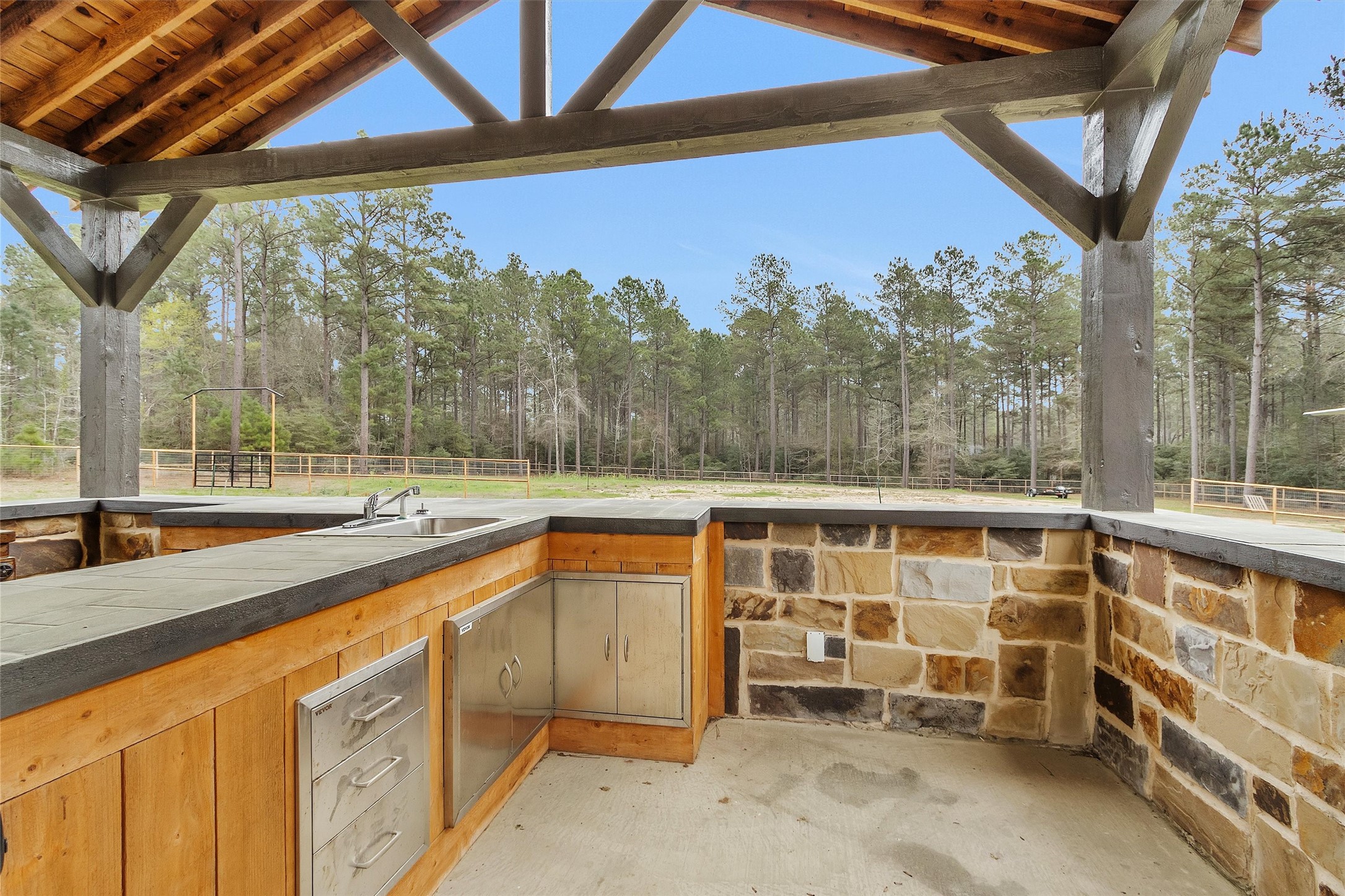 264 Grey Feather Road Huntsville, TX 77340 - Photo 25 of 31 a view of outdoor space with seating area