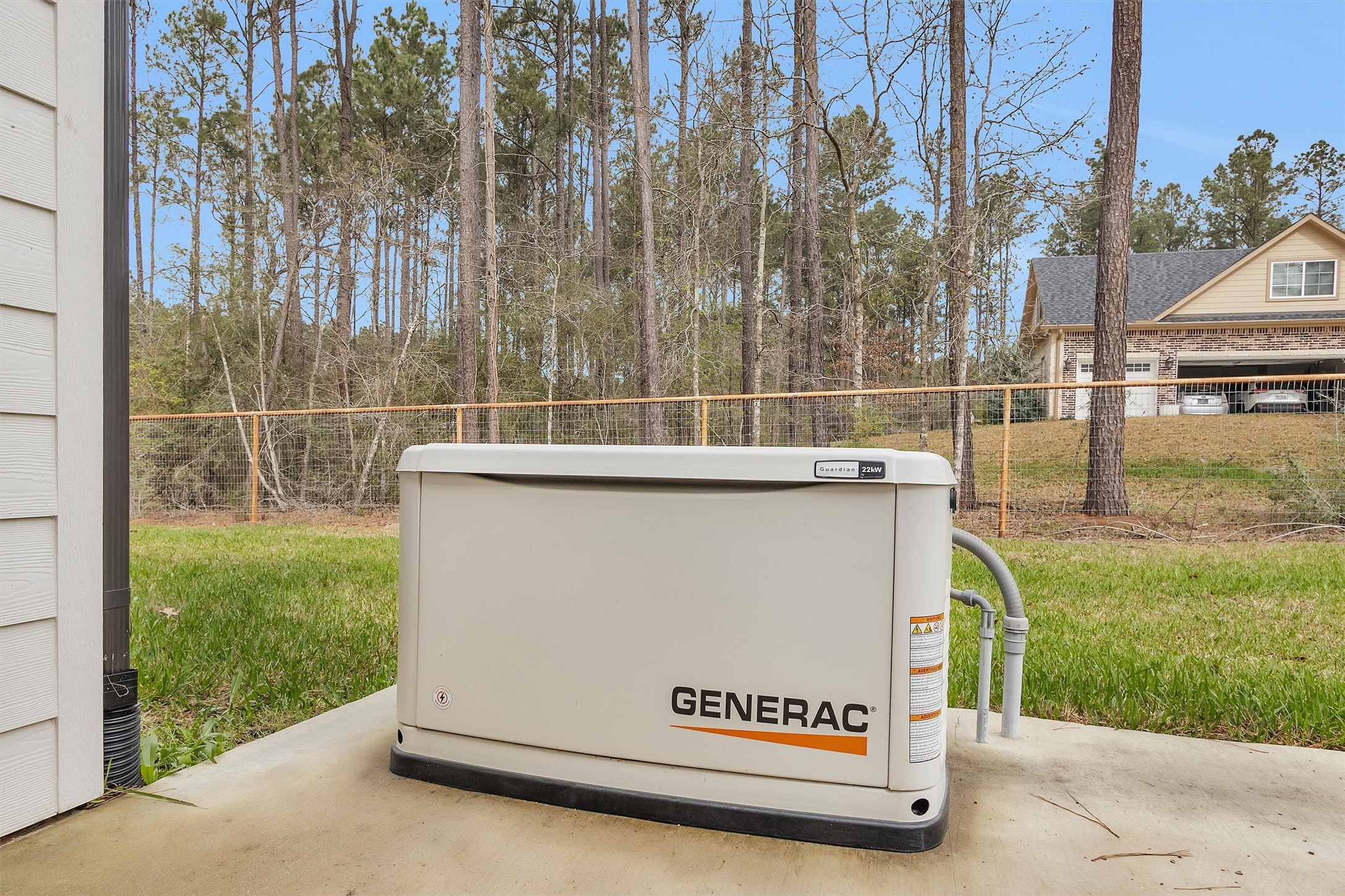264 Grey Feather Road Huntsville, TX 77340 - Photo 30 of 31 a view of backyard with trampoline