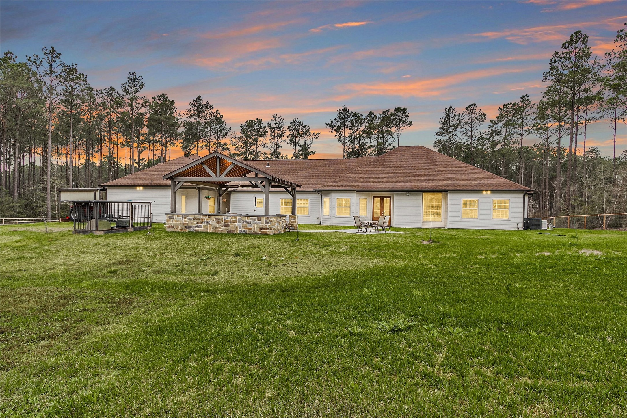 264 Grey Feather Road Huntsville, TX 77340 - Photo 5 of 31 a front view of a house with a garden