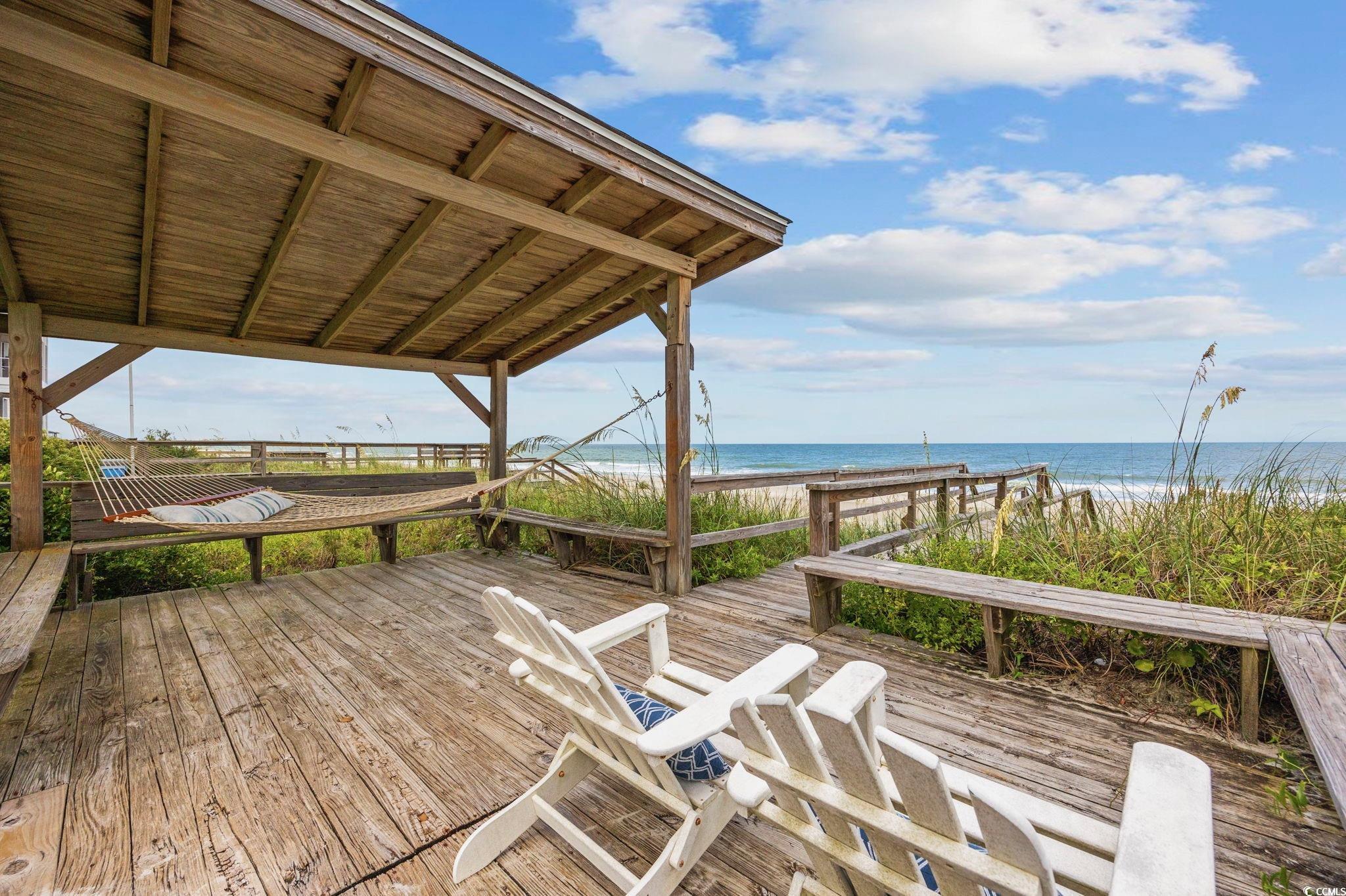 496 Myrtle Avenue Pawleys Island, SC 29585 - Photo 18 of 40 Wooden deck featuring a water view
