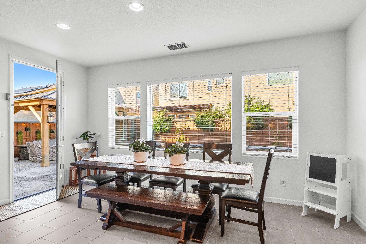 2305 Augusta Avenue Tracy, CA 95377 - Photo 26 of 91 a dining room with furniture and window