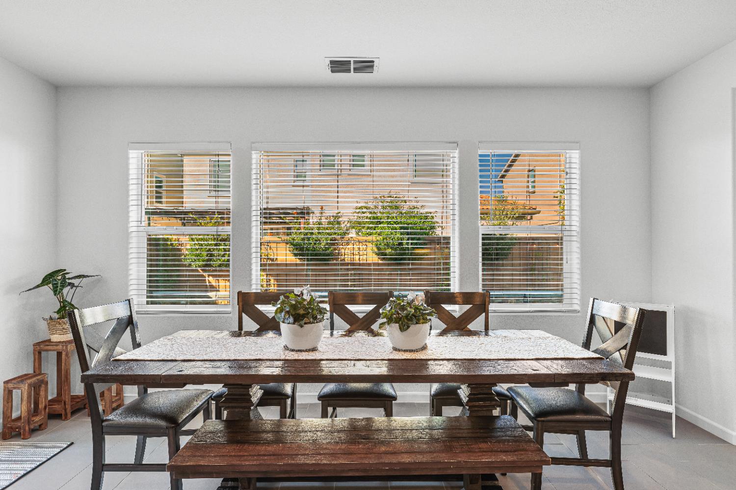 2305 Augusta Avenue Tracy, CA 95377 - Photo 27 of 91 a table with chairs and window