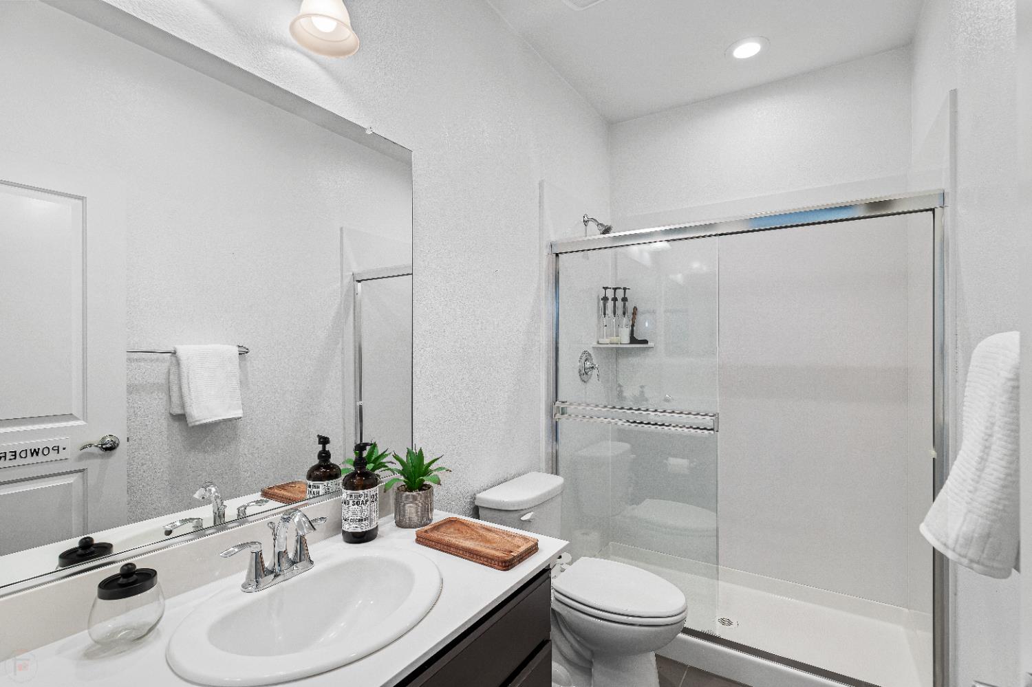 2305 Augusta Avenue Tracy, CA 95377 - Photo 32 of 91 a bathroom with a sink toilet and shower