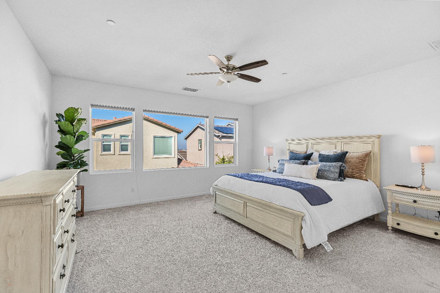 2305 Augusta Avenue Tracy, CA 95377 - Photo 39 of 91 a spacious bedroom with a bed and a window