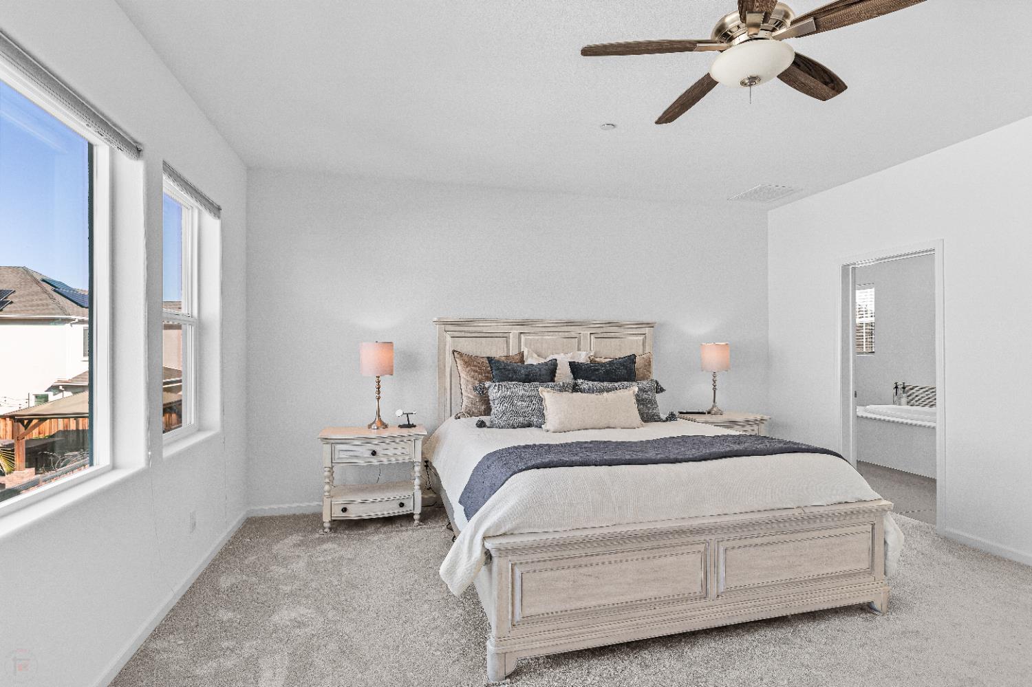 2305 Augusta Avenue Tracy, CA 95377 - Photo 40 of 91 a bedroom with a bed and large window