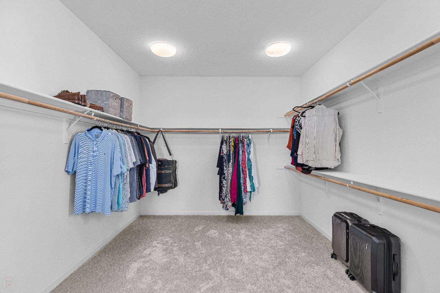 2305 Augusta Avenue Tracy, CA 95377 - Photo 46 of 91 a view of walk in closet with clothes and shoes