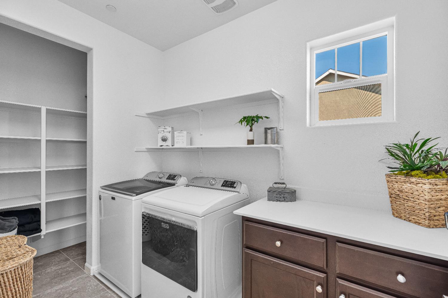 2305 Augusta Avenue Tracy, CA 95377 - Photo 47 of 91 a utility room with sink dryer and washer