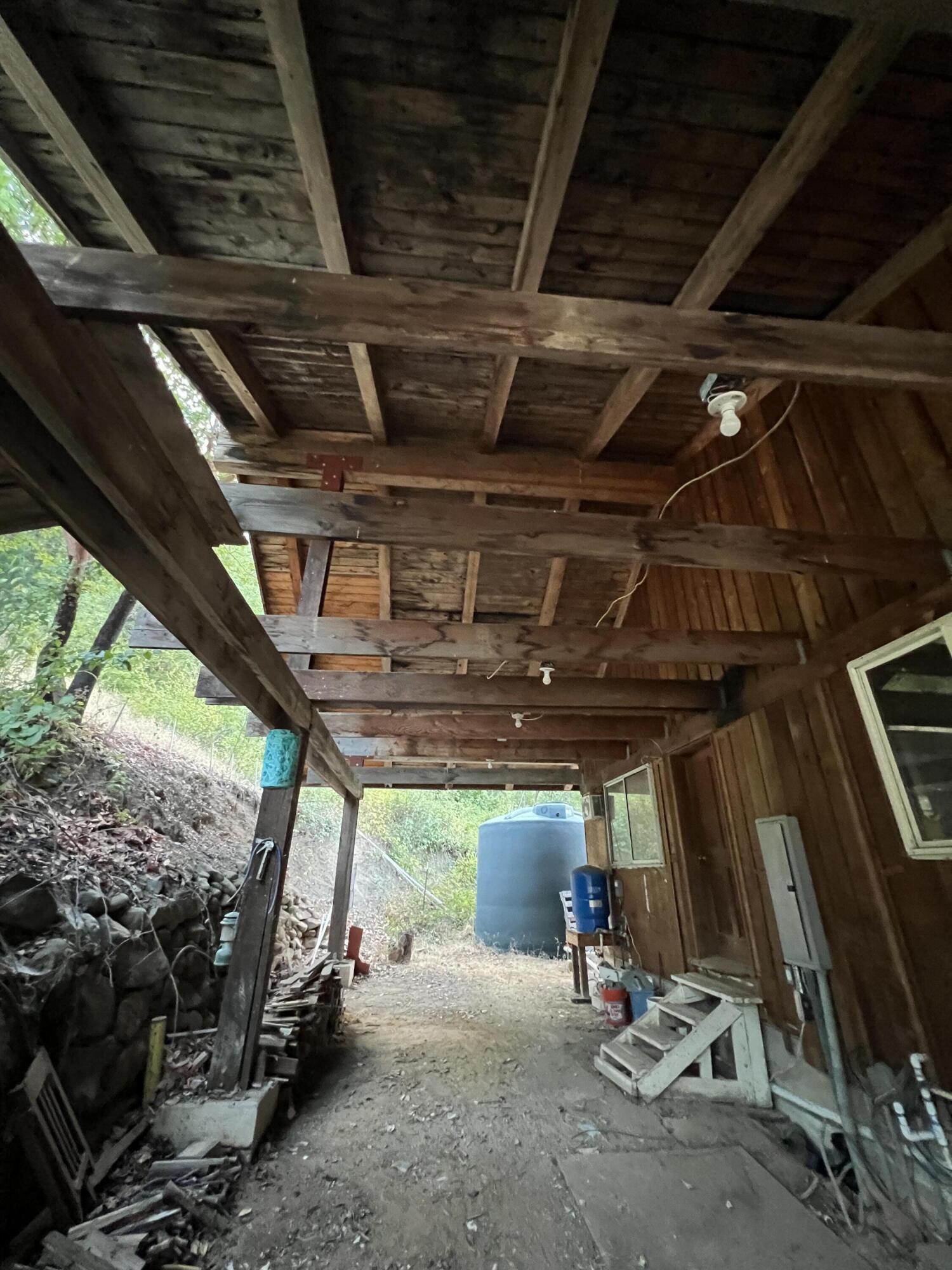 511 Tucker Hill Road Douglas City, CA 96024 - Photo 37 of 41 Massive timbers extend throught carport