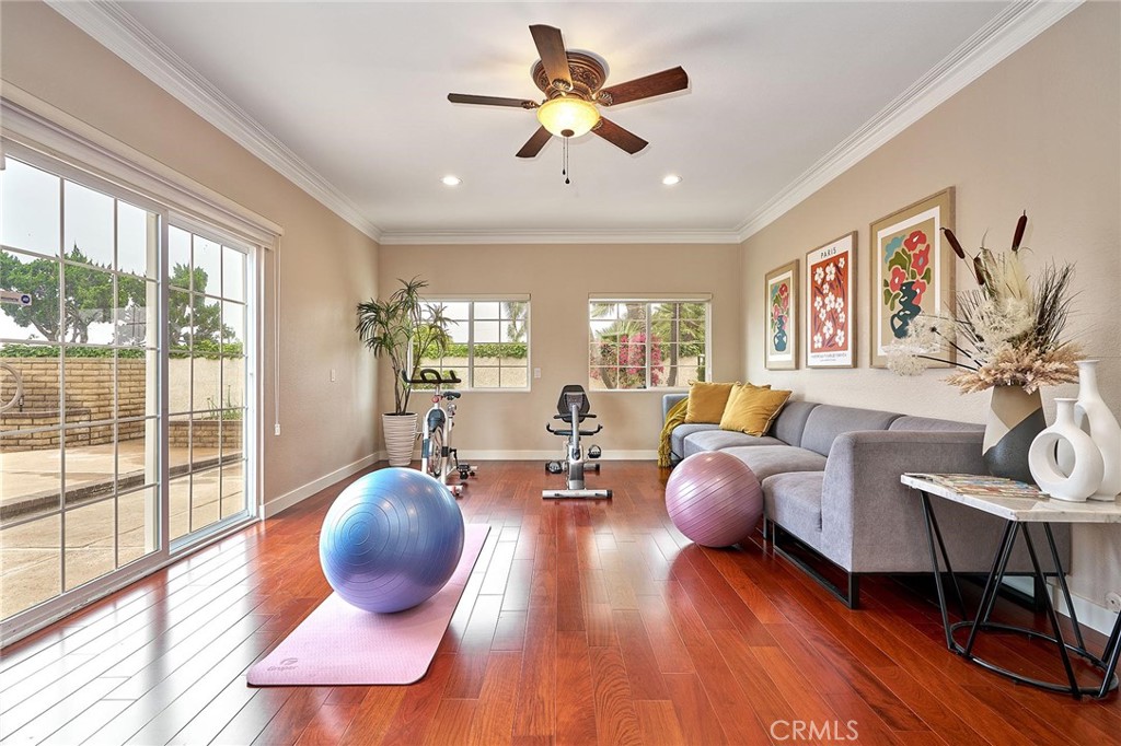 8652 Los Coyotes Drive Buena Park, CA 90621 - Photo 22 of 72 a living room with furniture and a large window