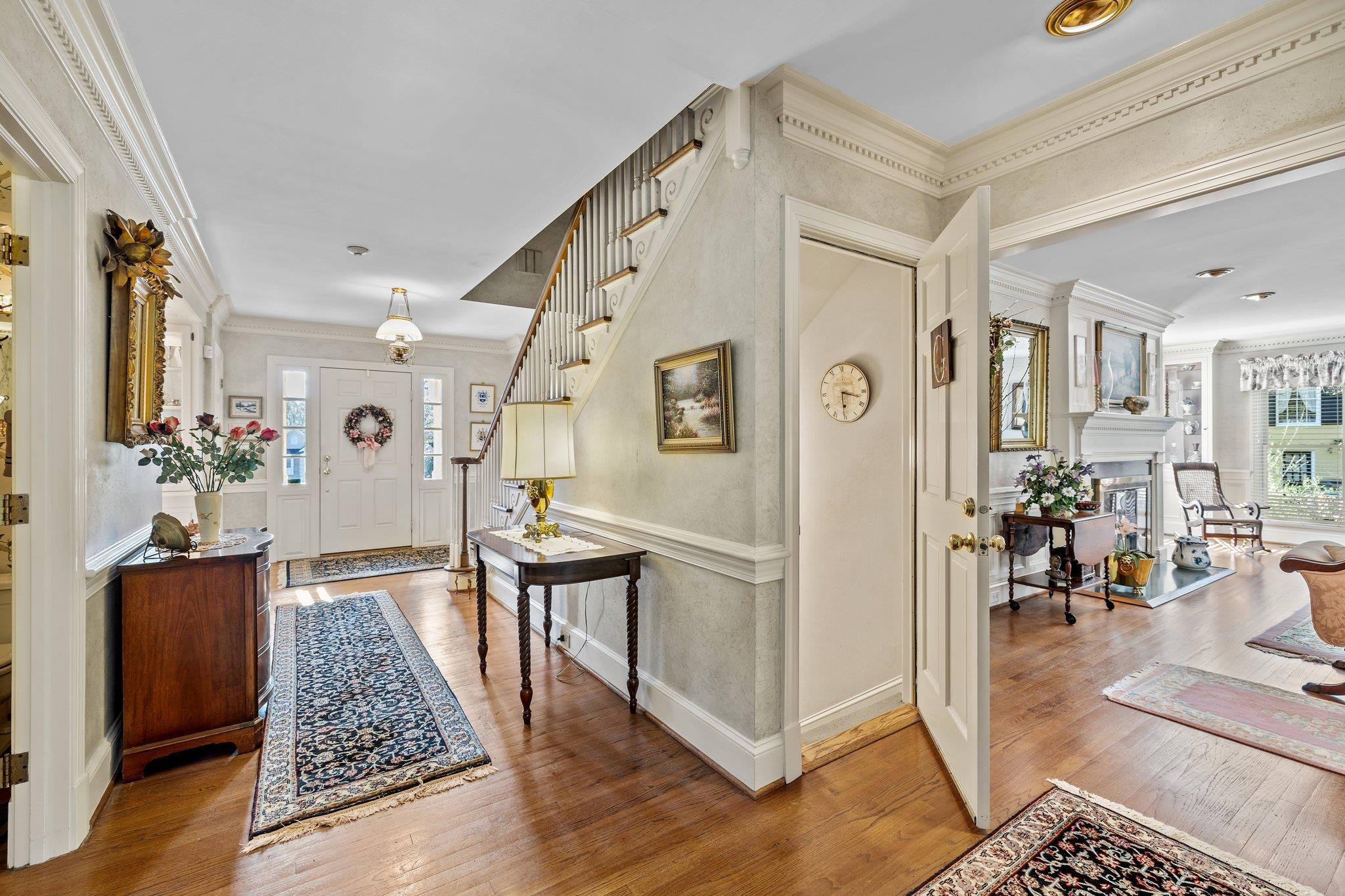 3608 Dover Road Durham, NC 27707 - Photo 16 of 60 a view of an entryway with wooden floor and a livingroom view