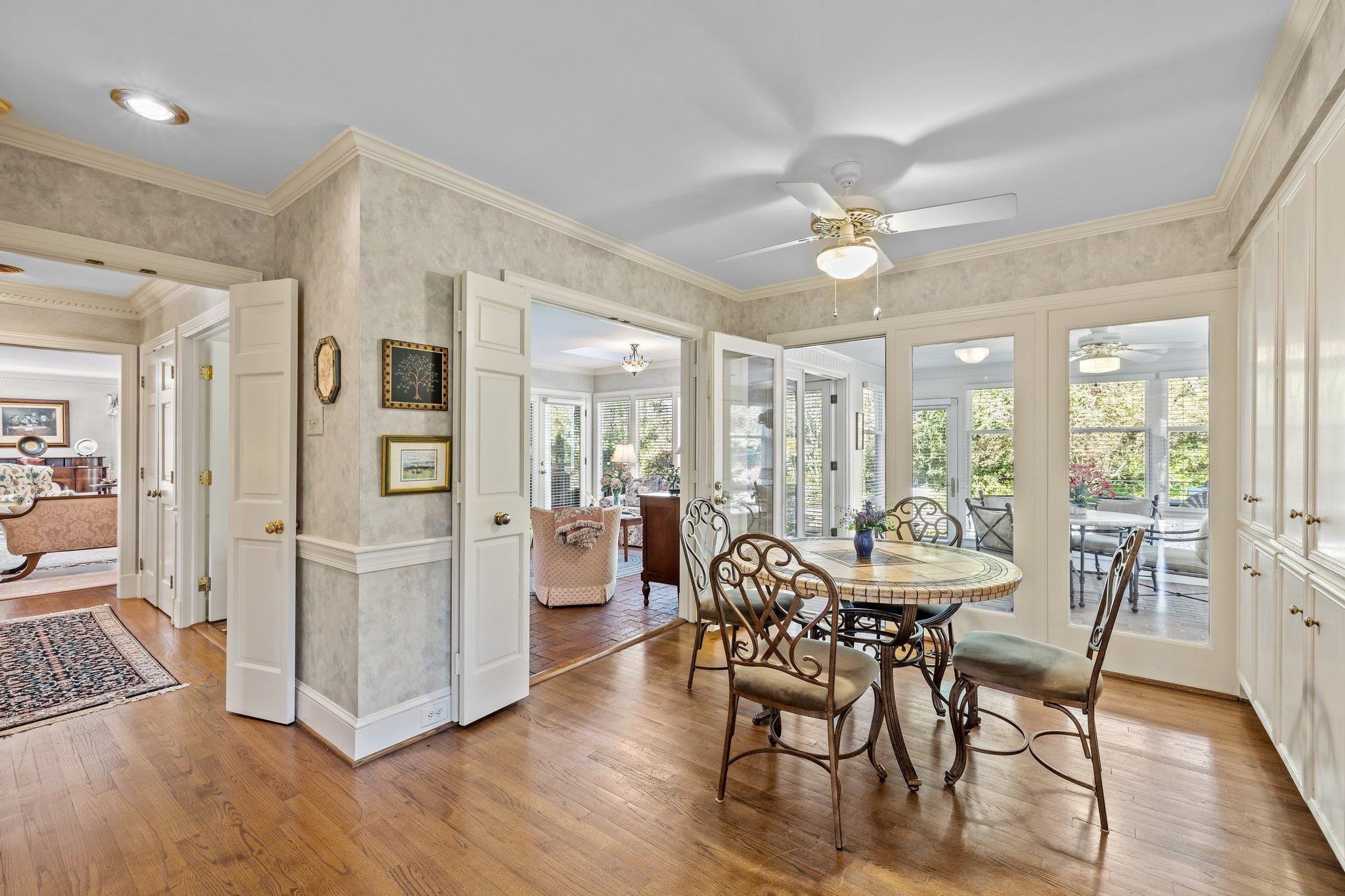 3608 Dover Road Durham, NC 27707 - Photo 22 of 60 a view of a dining room with furniture window and wooden floor