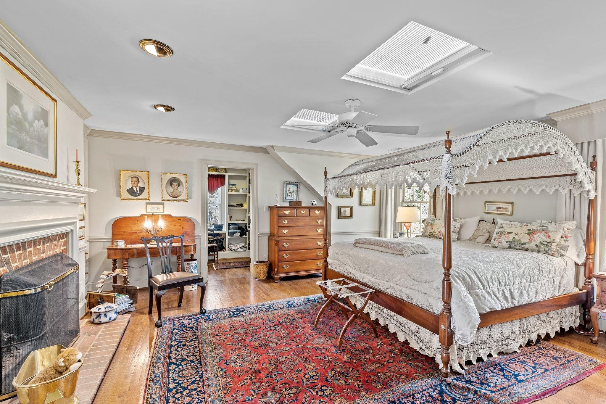 3608 Dover Road Durham, NC 27707 - Photo 40 of 60 a bedroom with a bed and wooden floor