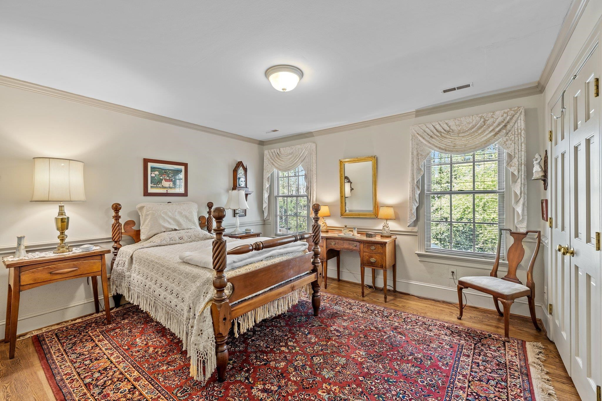 3608 Dover Road Durham, NC 27707 - Photo 45 of 60 a bed room with a bed and a chair