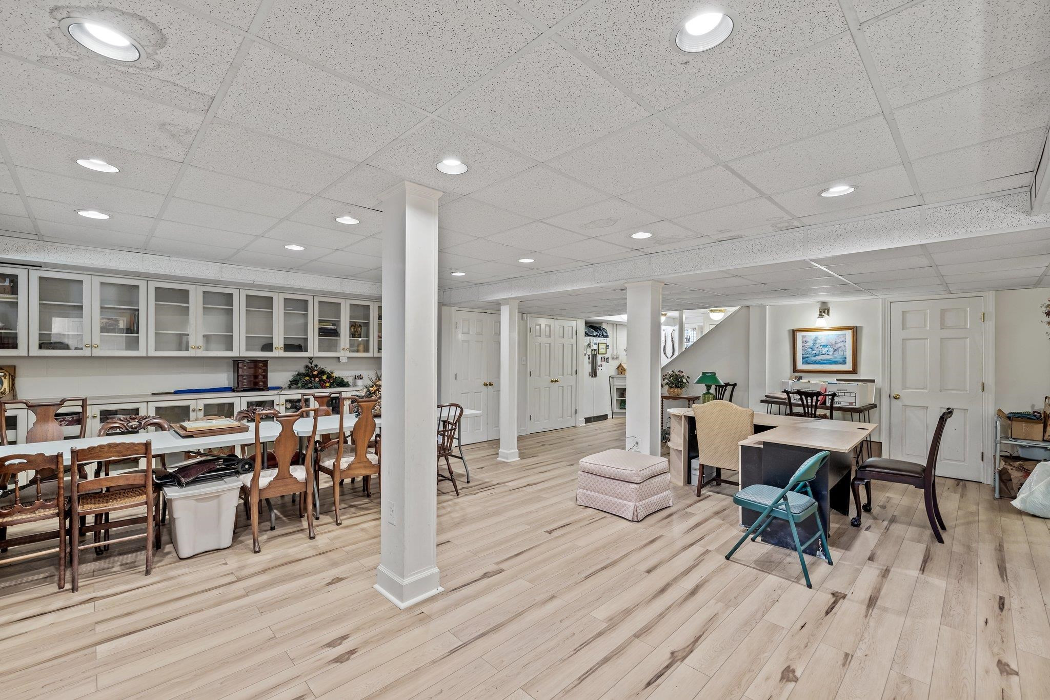 3608 Dover Road Durham, NC 27707 - Photo 52 of 60 a view of a dining area with furniture window and wooden floor